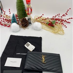 Ysl Saint Laurent Quilted monogram pouch made in Italy